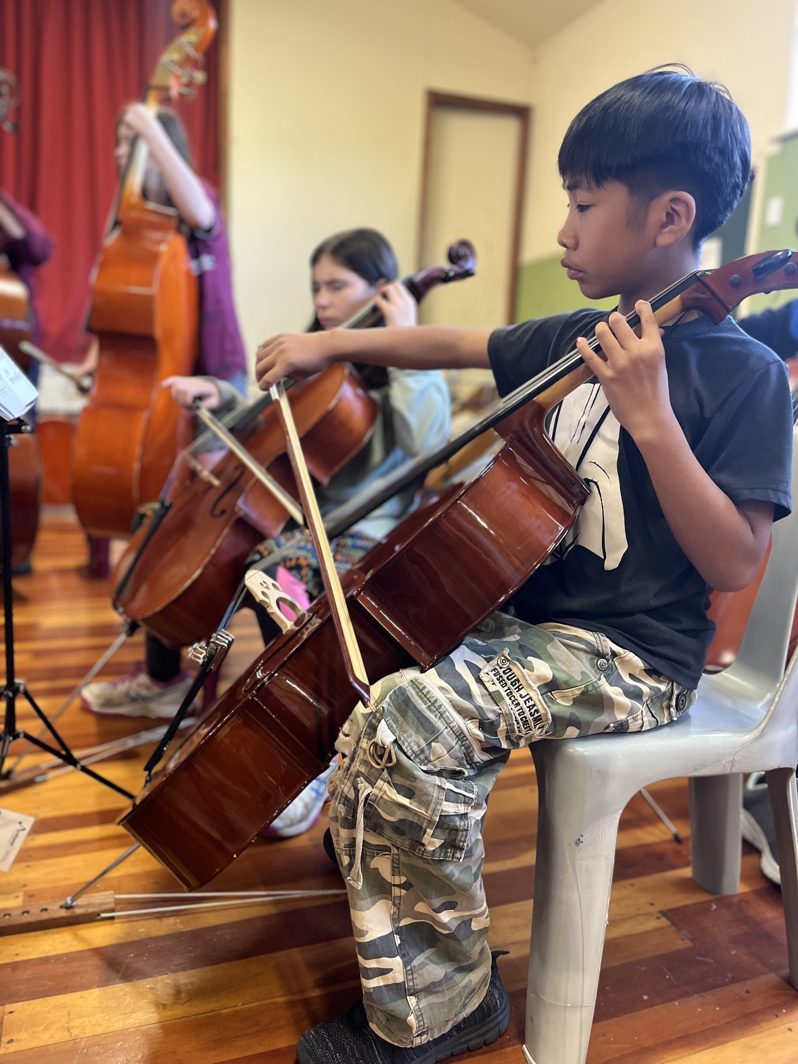 Young cellist at a holiday programme